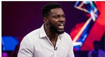 Kola shouting angrily during an intense argument on the BBNaija Season 10 Reunion stage